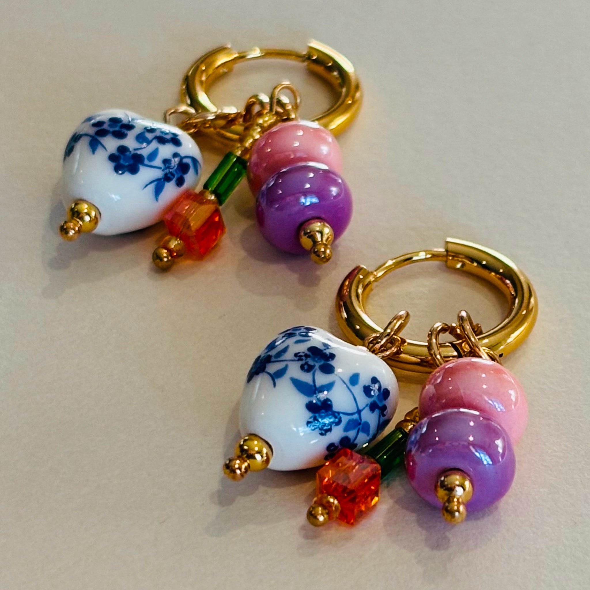 Pair of earrings with floral beads and gold accents