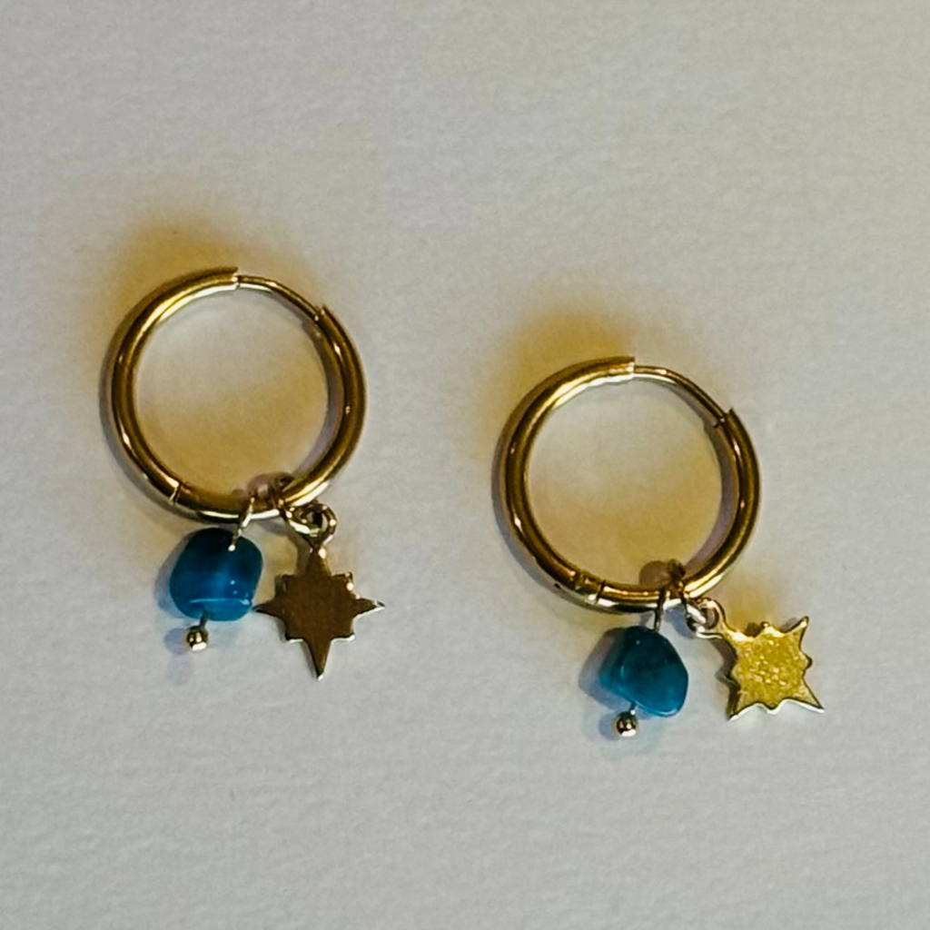 Gold hoop earrings with blue beads and star charms