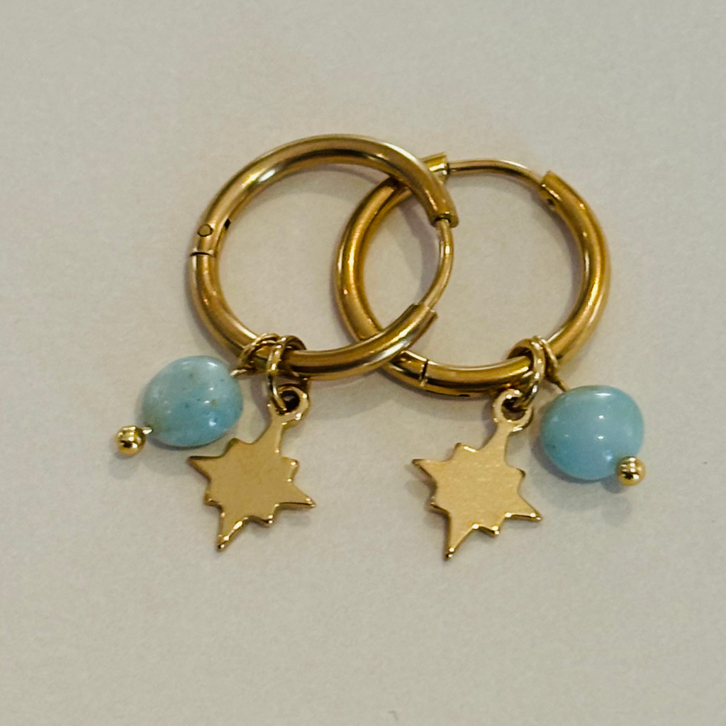Gold hoop earrings with star and turquoise bead charms