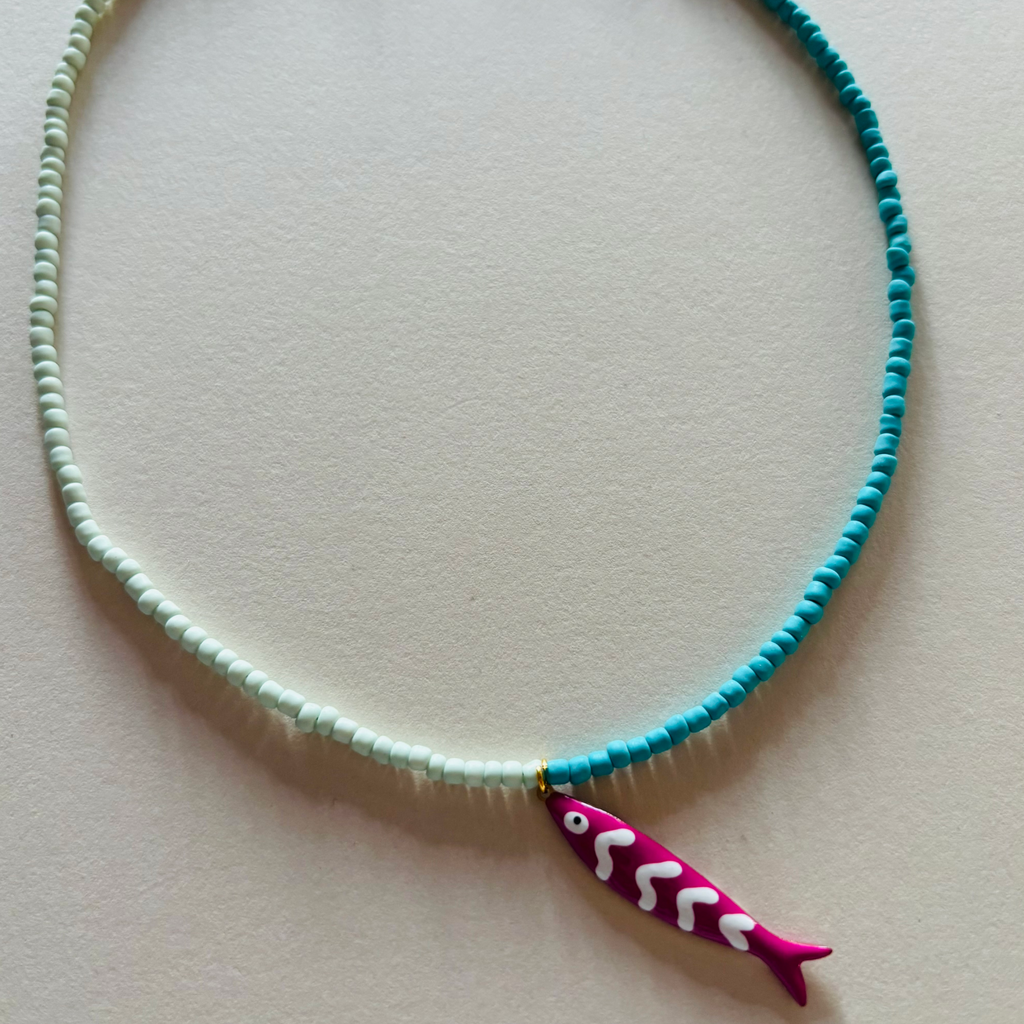 Necklace with a fish-shaped pendant