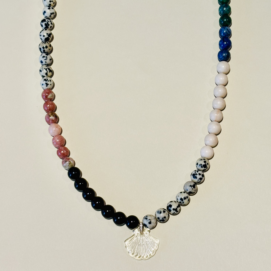 Necklace with multicolored beads and a shell pendant