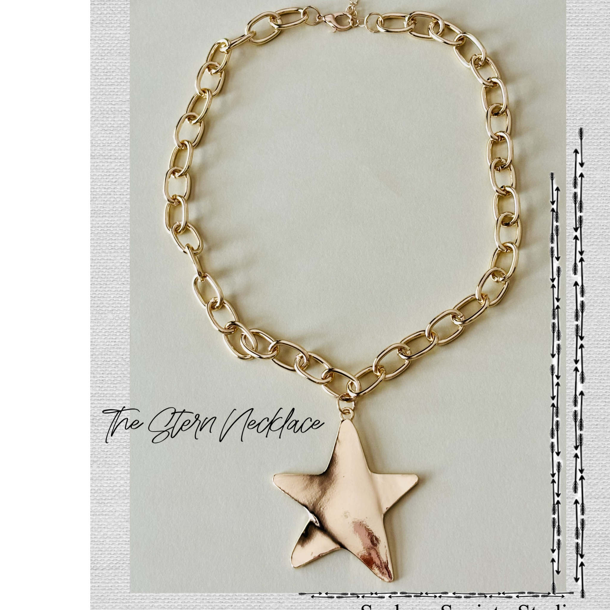 Gold chain necklace with a star-shaped pendant