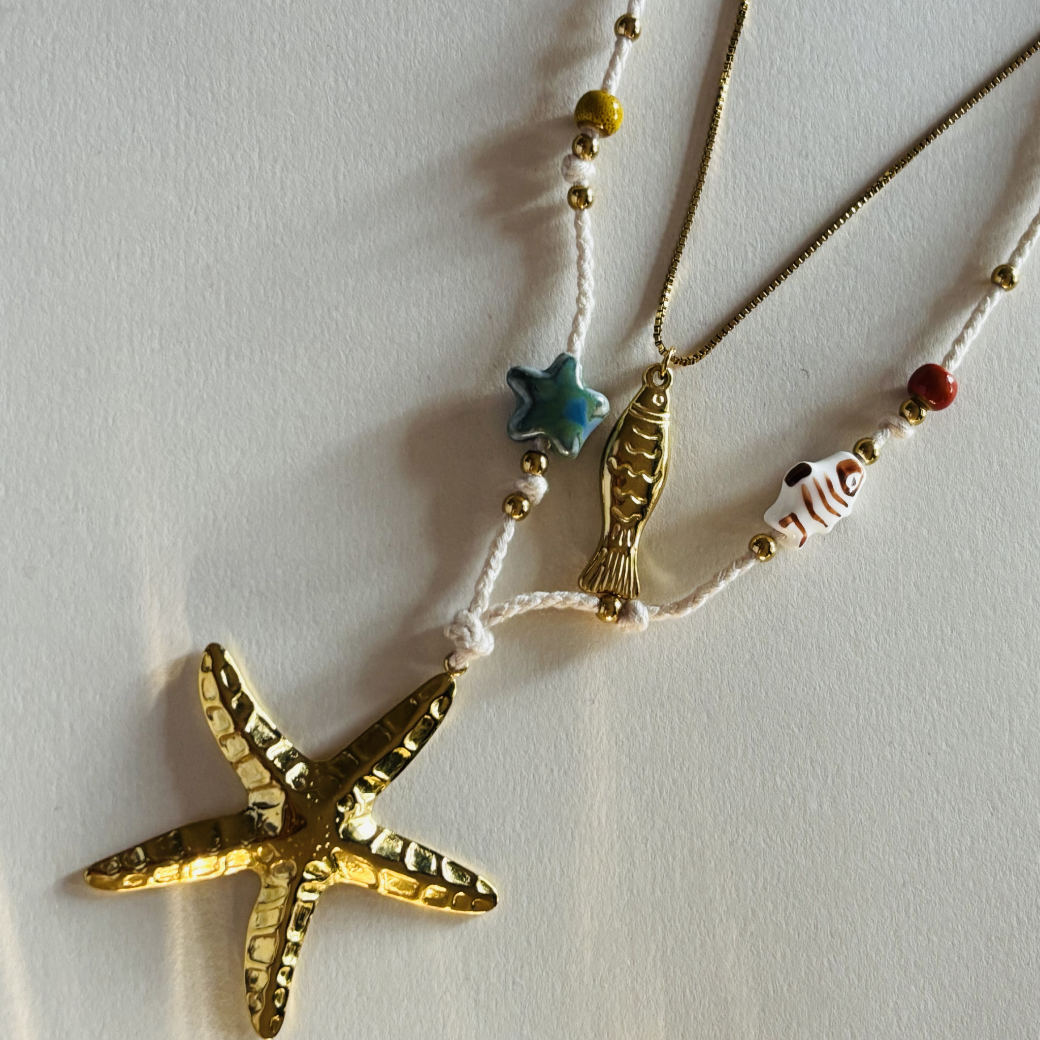 Necklace with starfish pendant and colorful beads