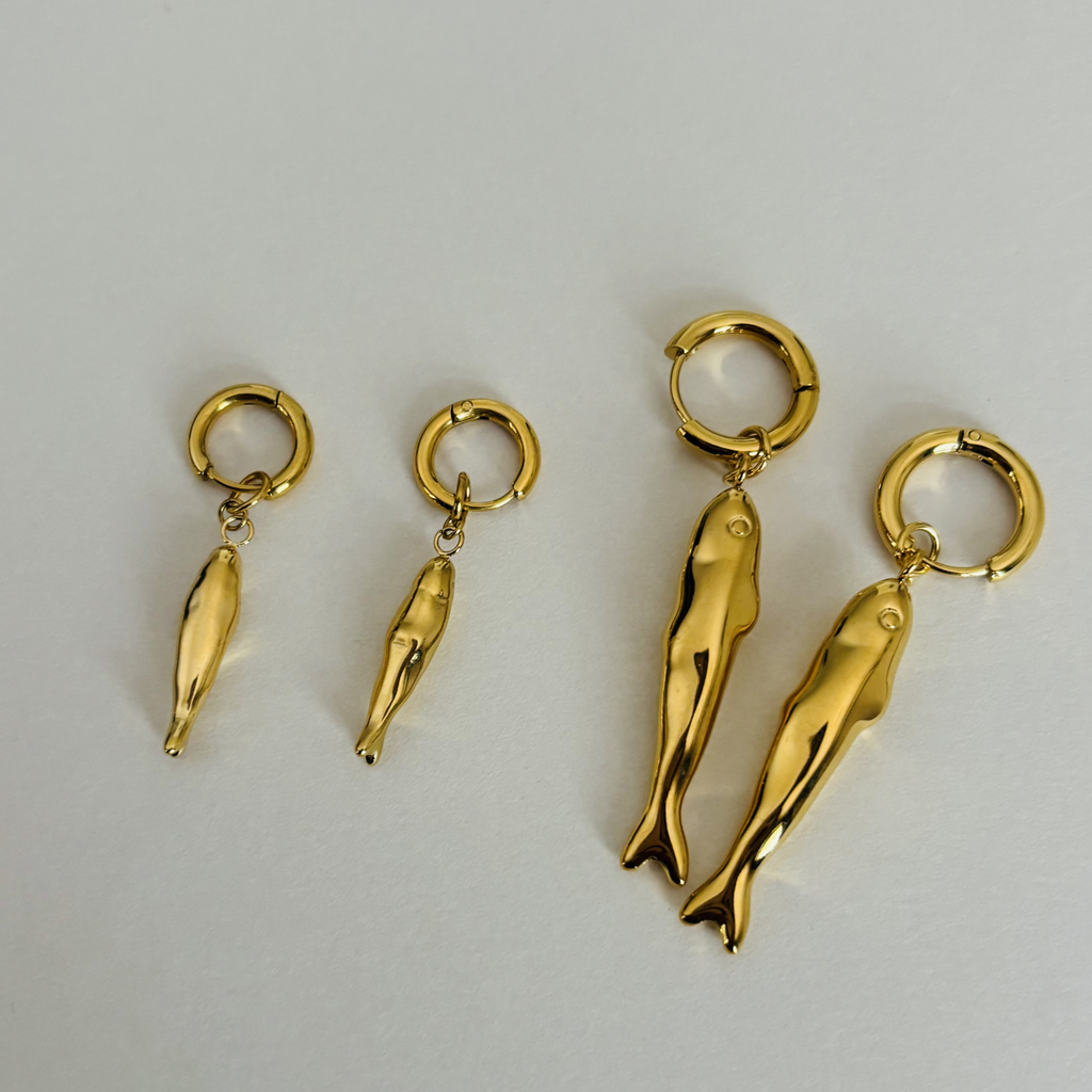 Two pairs of handcrafted sardine fish-shaped earrings