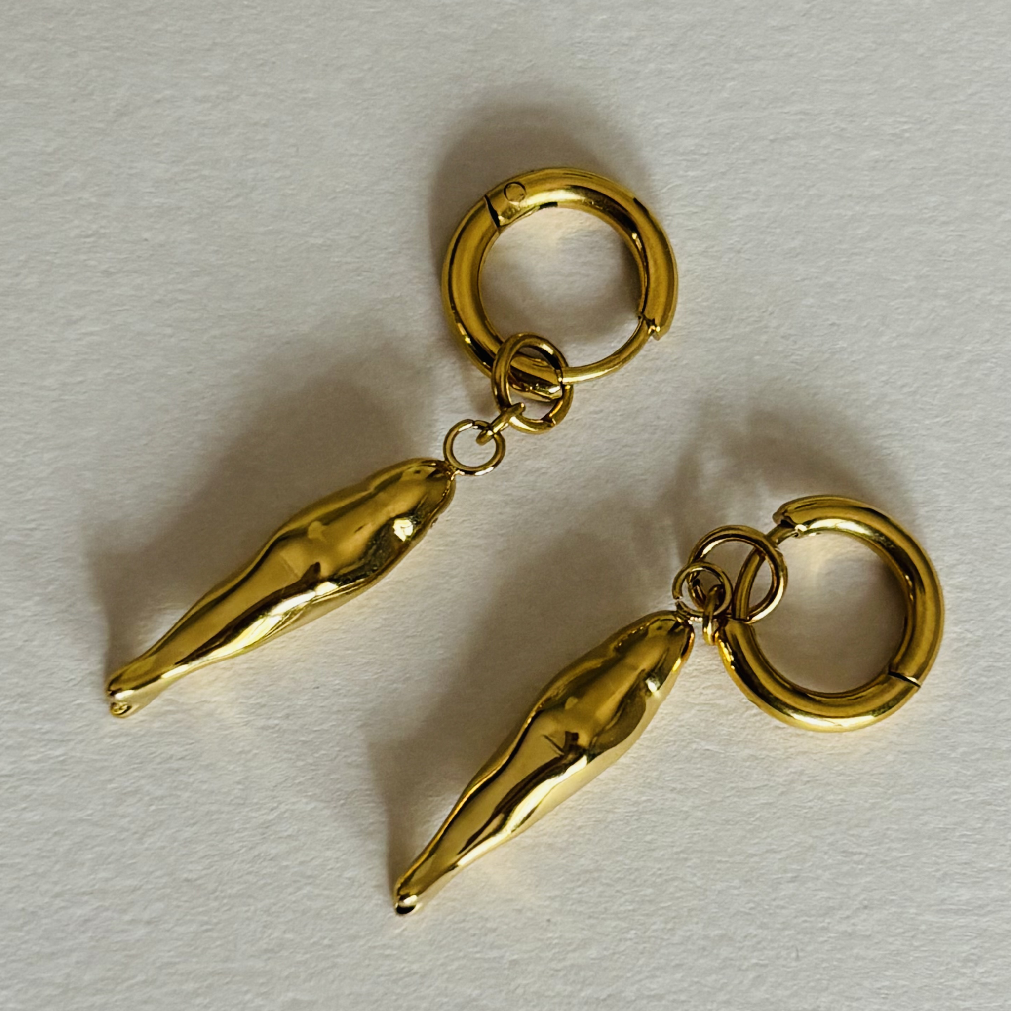 Pair of handcrafted gold earrings