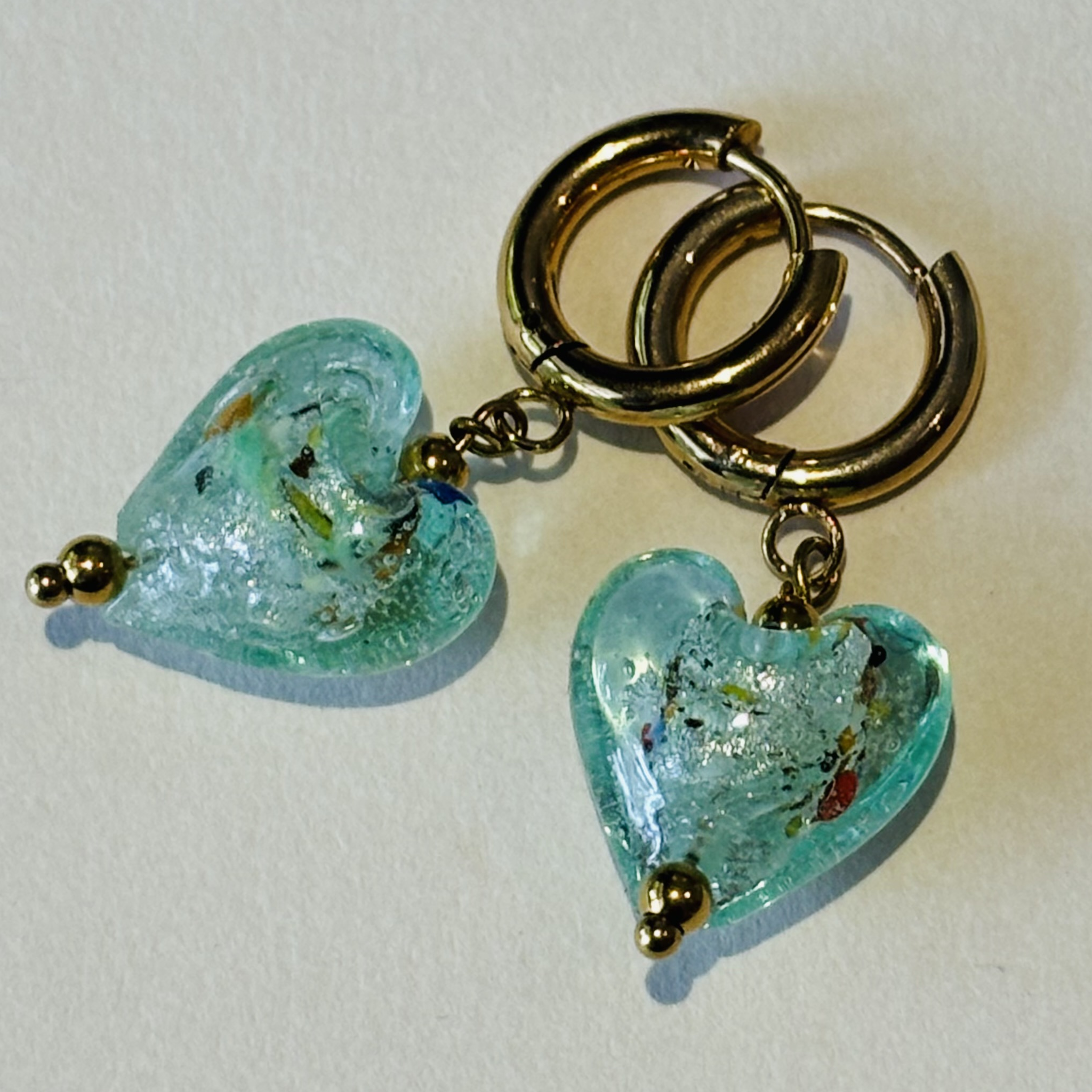 Turquoise heart-shaped earrings with gold accents