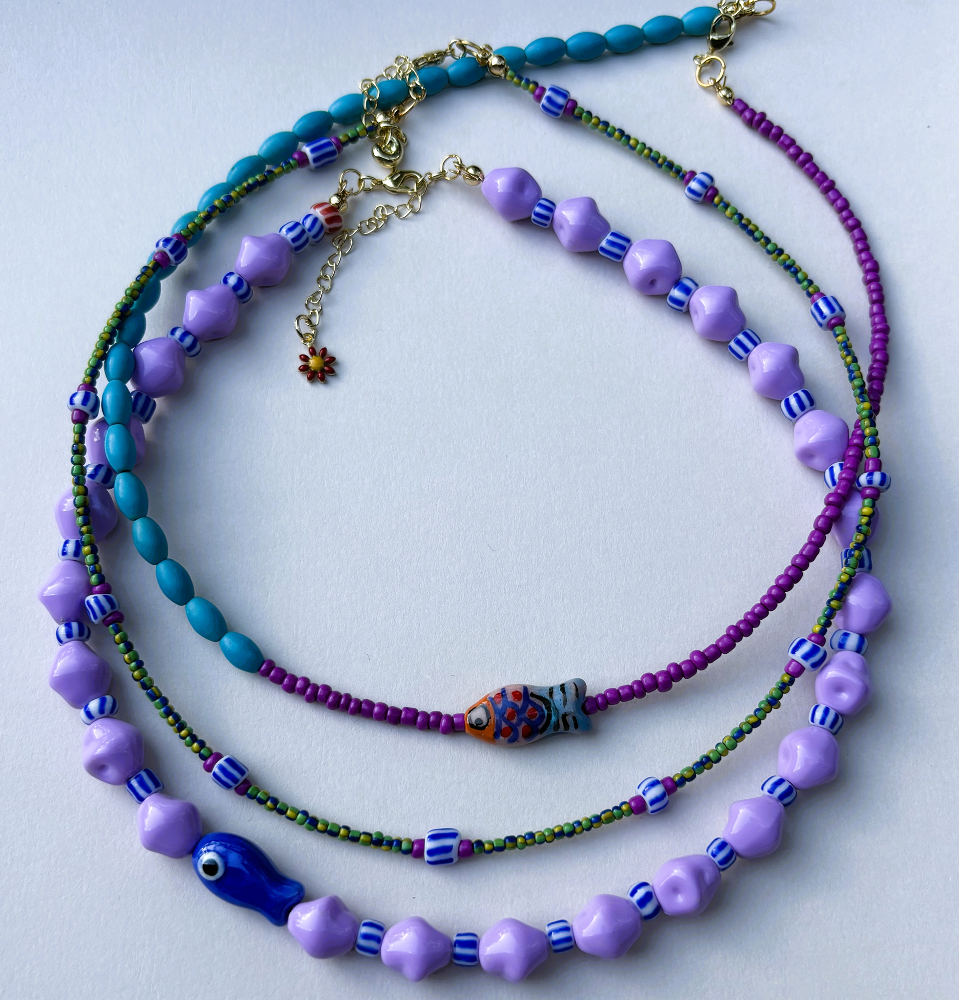 Three colorful beaded necklaces