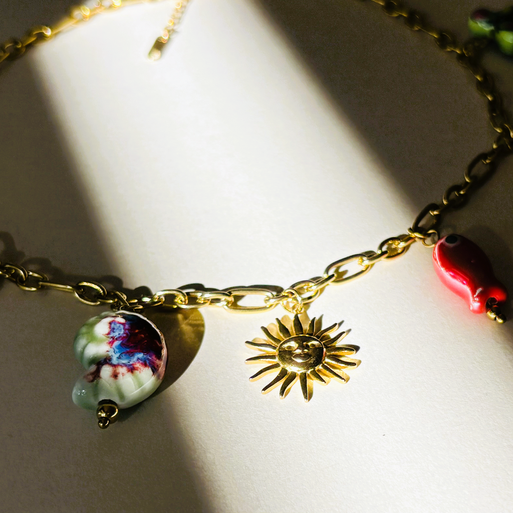 Necklace with various charms