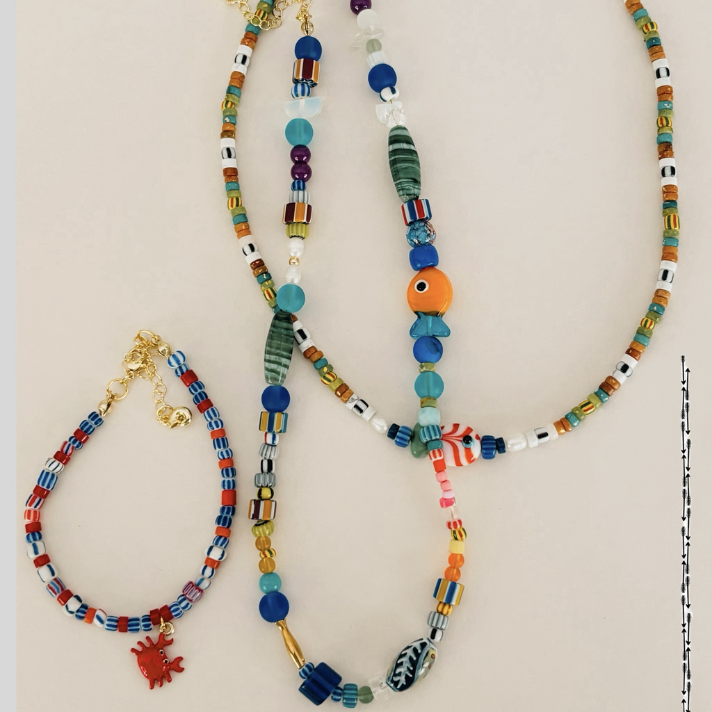 Three handcrafted colourful beaded neckalces