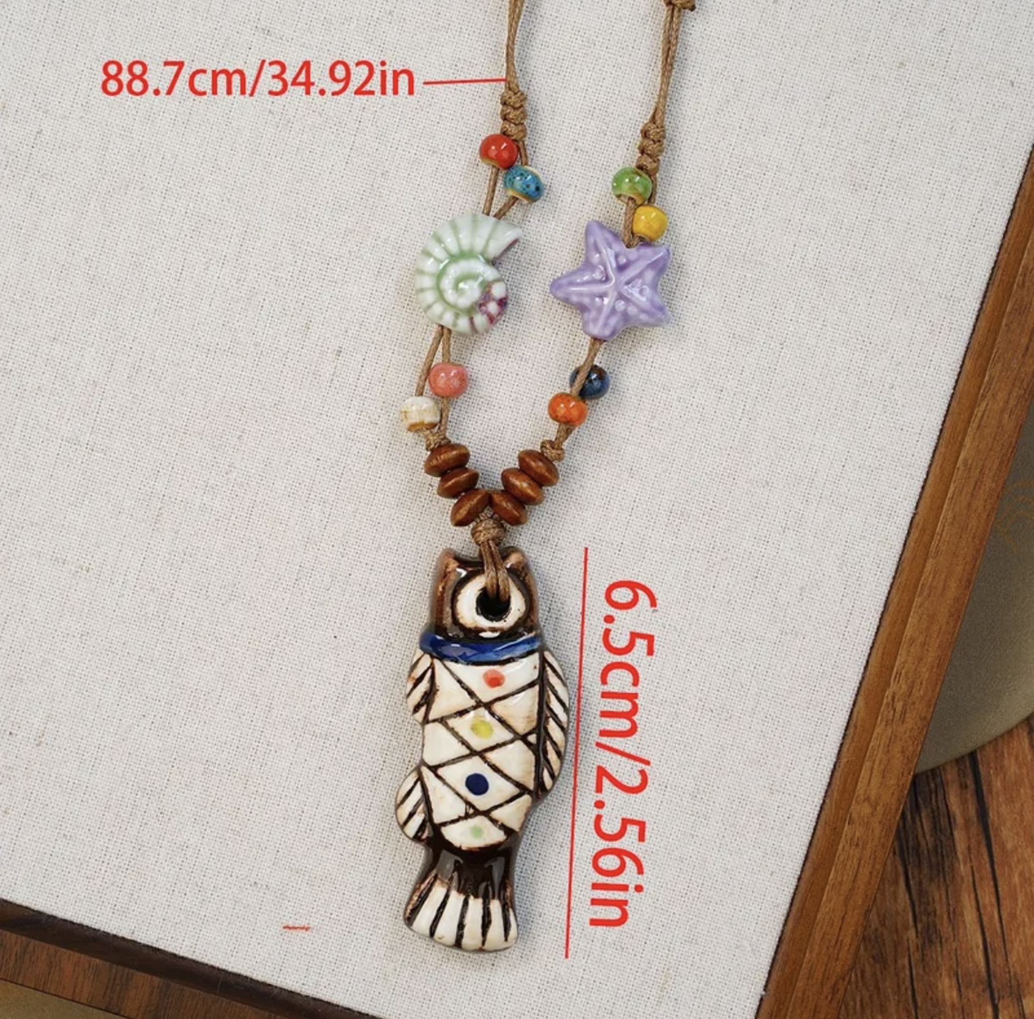 Colorful necklace with a fish-shaped pendant